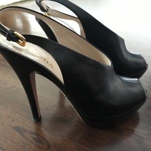 Prada heels.